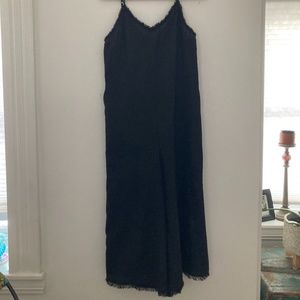 Black flowy jumpsuit with fringe size small